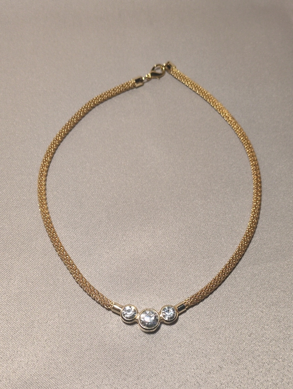 Gold Tone Mesh Necklace with Triple Crystal Accent